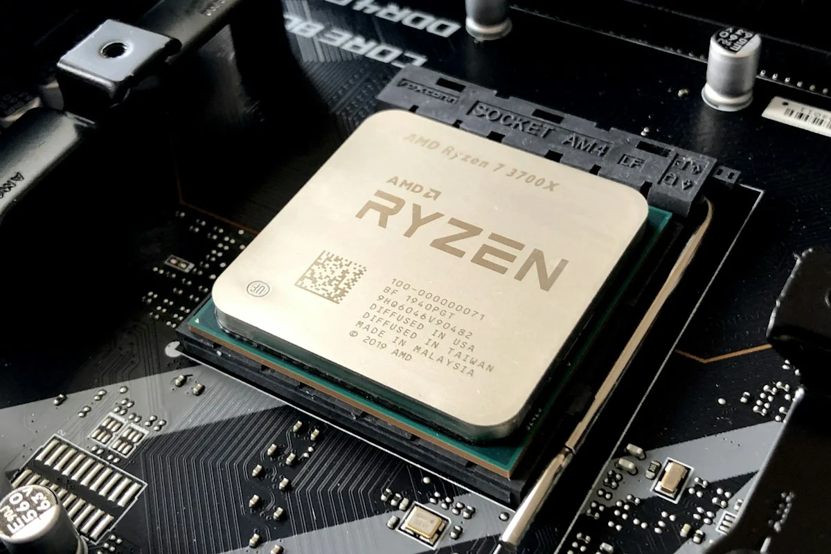 Close-up of modern semiconductor wafer processor showing integrated Neural Processing Unit (NPU) die layout